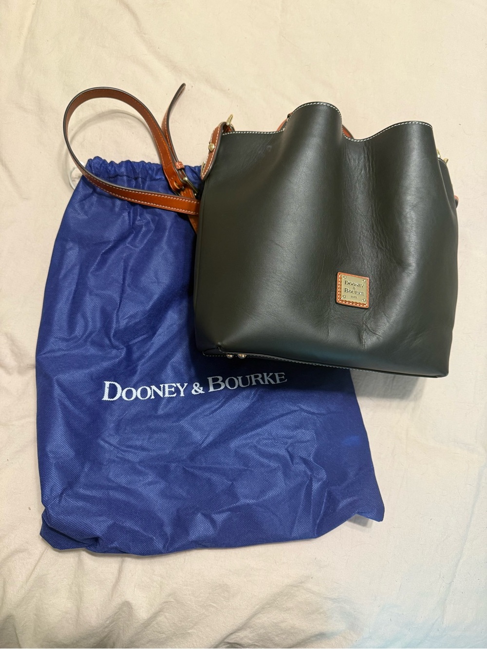 Dooney & Bourke Black Leather Bucket Bag with Brown Trim
